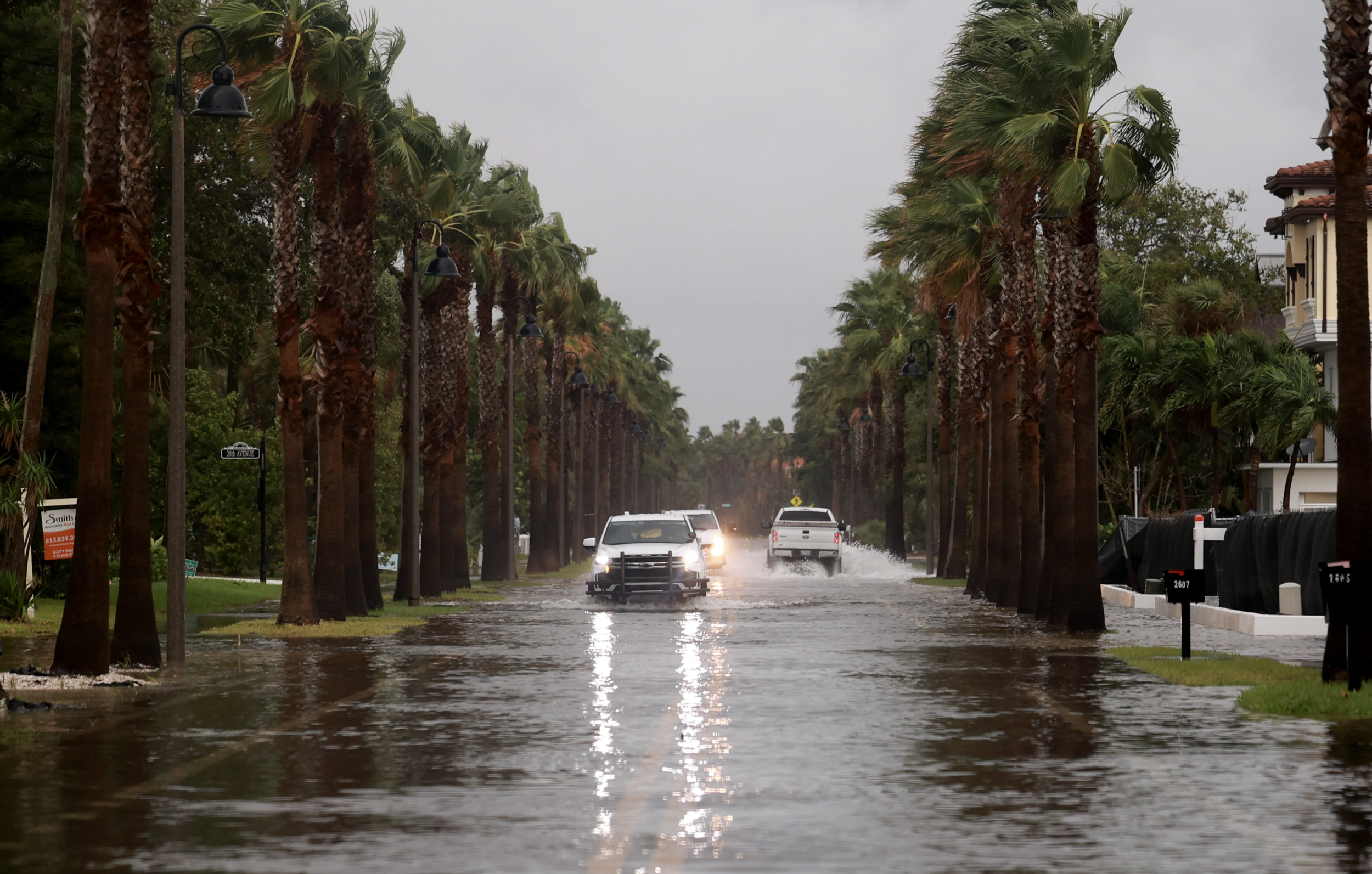 Photo: Vehicles drive along a flooded street as Hurricane Helene churns offshore on September 26, 2024 in St. Pete Beach, Florida. (Joe Raedle/Getty Images)