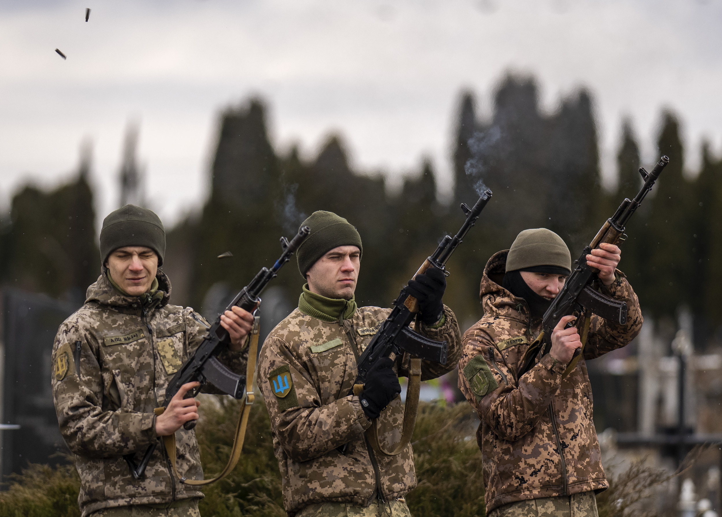 Photo: Ukrainian soldiers fire salvoes during the funeral of Roman in Bila Tserkva, near Kyiv. (AP Images)